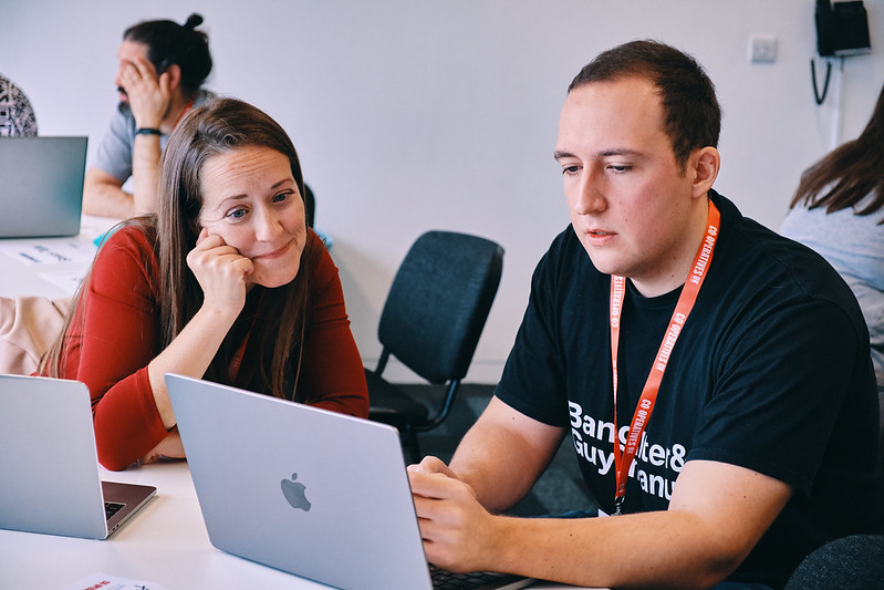 People collaborating at laptops