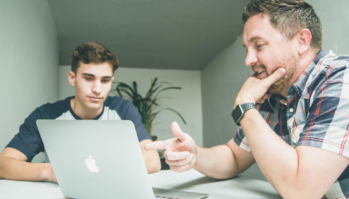 Man giving advice to younger man