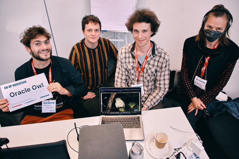 The Animorph team holding up an Oracle Owl sign