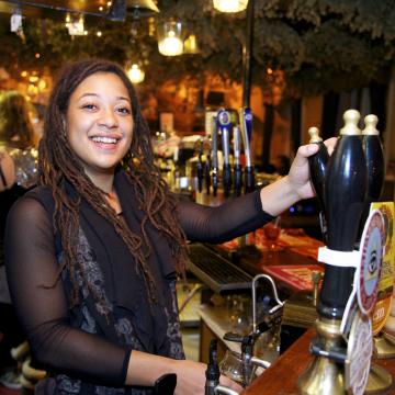 Woman serving drinks