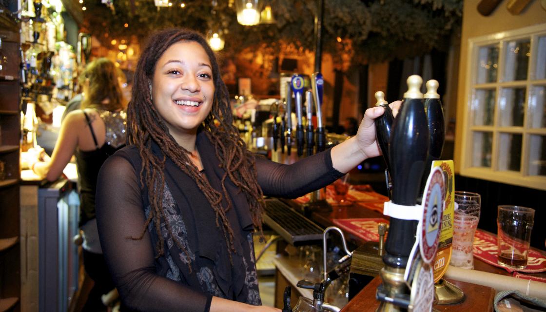 Woman serving drinks