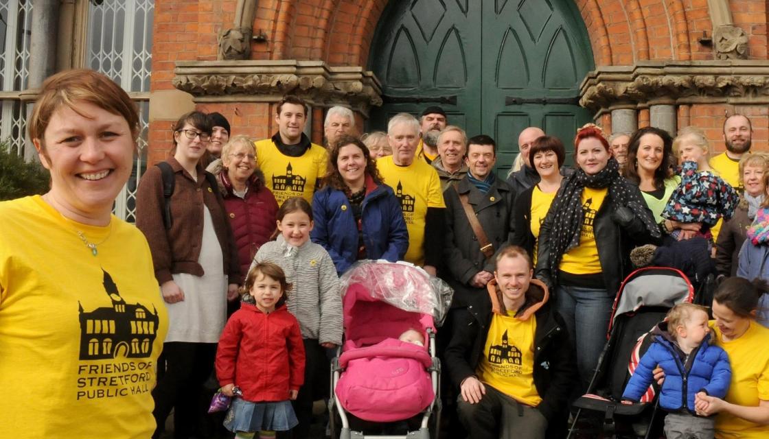 Group of people in front of a building