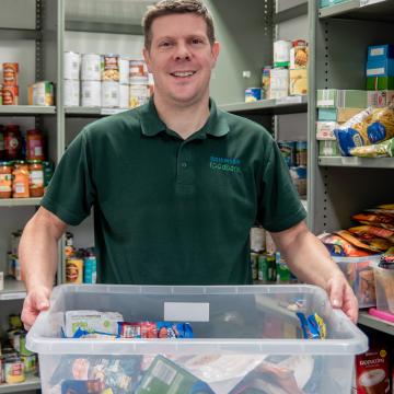 Man working in a food bank