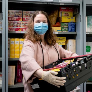 Woman helping in a food bank