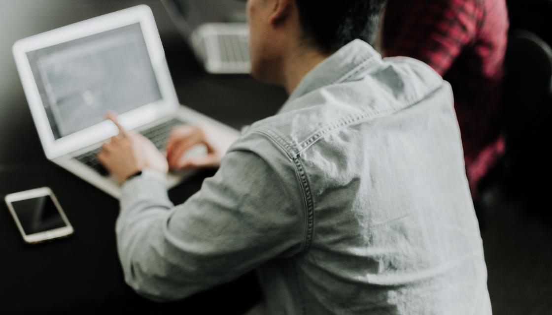 Person looking at laptop